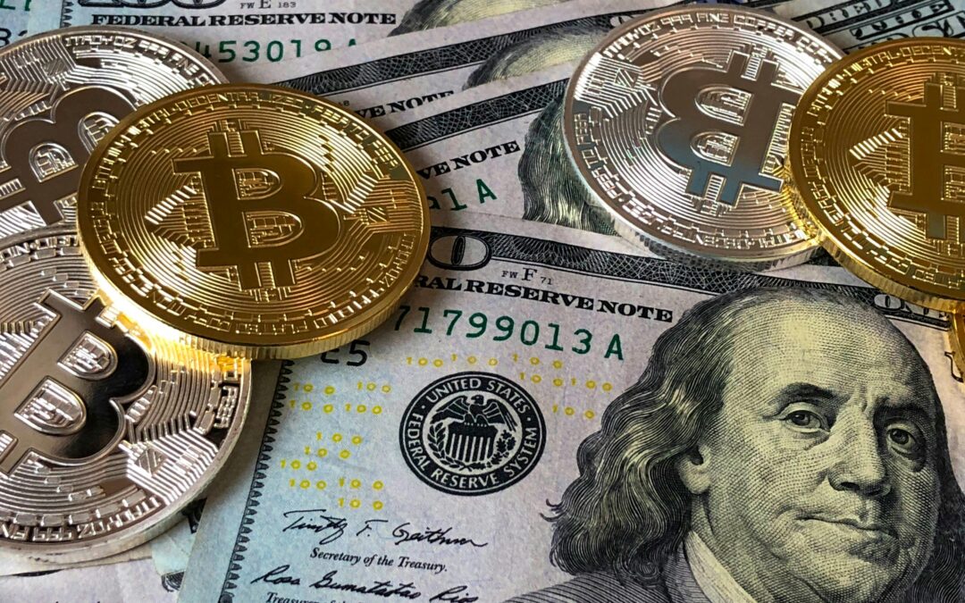 photo of bitcoins and us dollar bills