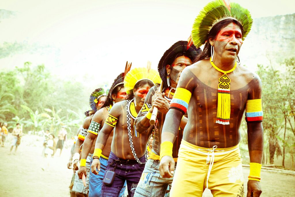 An Indigenous Tribe dancing in a clearing